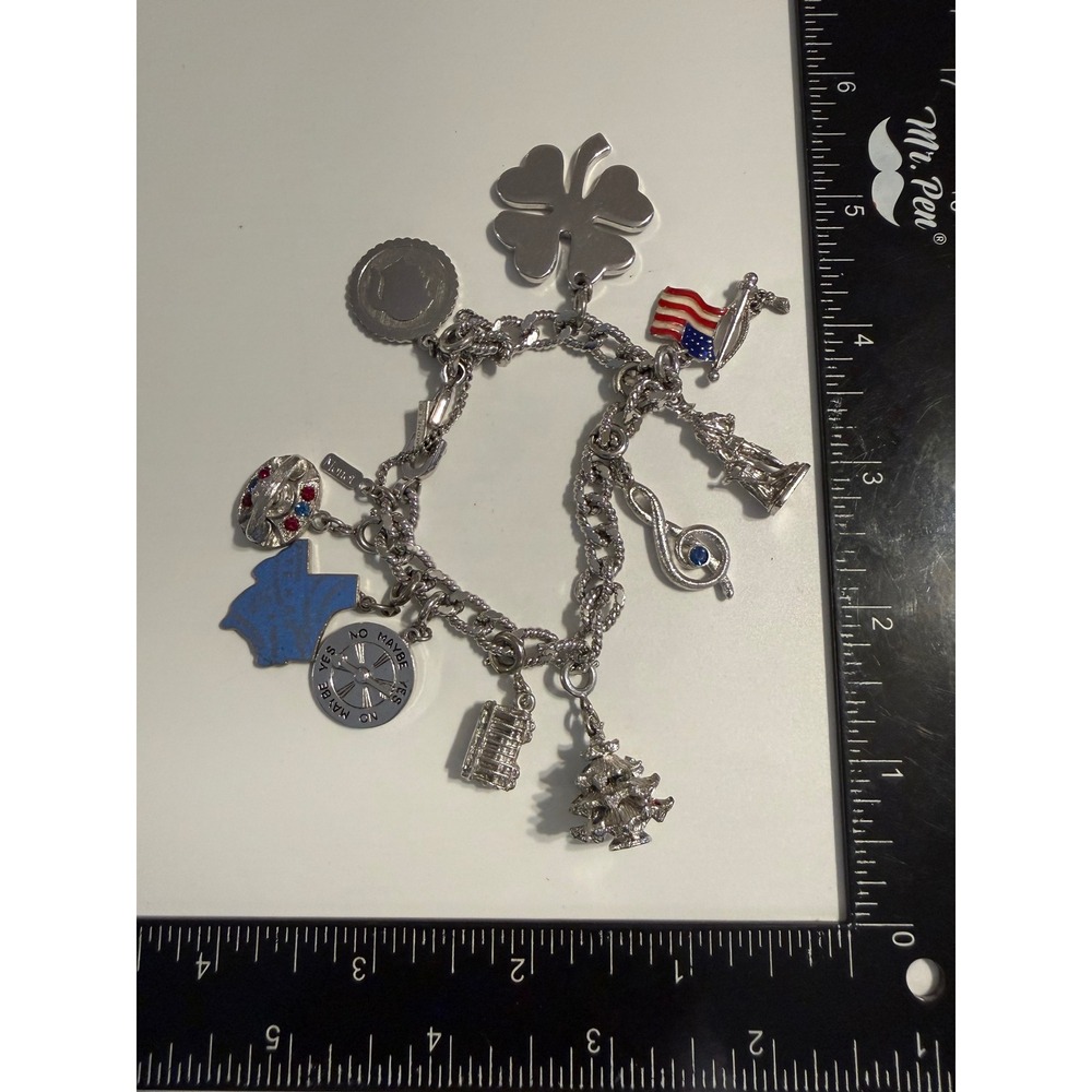 Vintage Monet Silver Tone Charm Bracelet 11 Charms Texas Flag Music Clover 7.5"